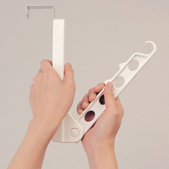 DOOR HANGING ROOM HANGER WITH FOLDABLE ARM